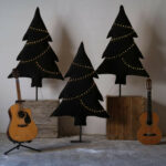 les-sapins-enneiges-verts